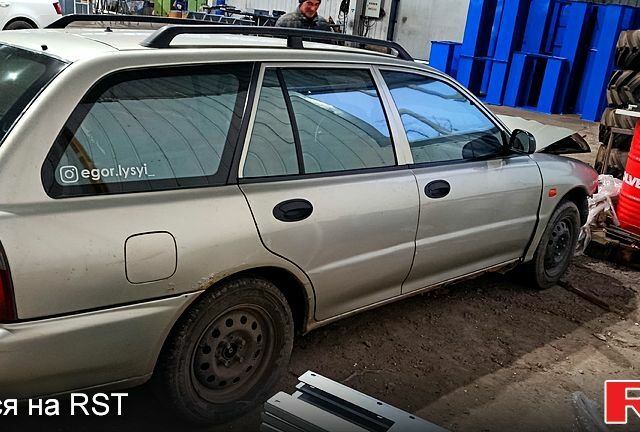 Сірий Міцубісі Lancer, об'ємом двигуна 1.6 л та пробігом 430 тис. км за 700 $, фото 1 на Automoto.ua