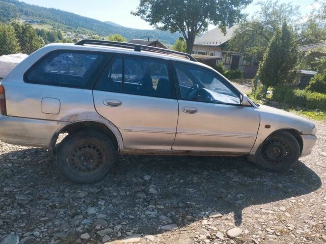 Сірий Міцубісі Lancer, об'ємом двигуна 1.6 л та пробігом 405 тис. км за 1000 $, фото 1 на Automoto.ua