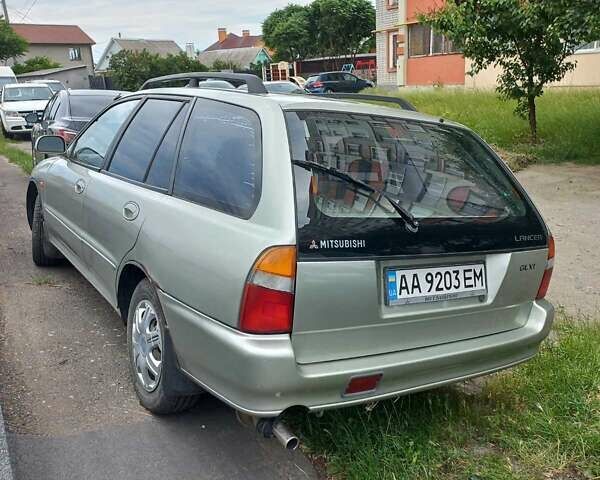 Серый Мицубиси Лансер, объемом двигателя 1.6 л и пробегом 282 тыс. км за 2401 $, фото 1 на Automoto.ua