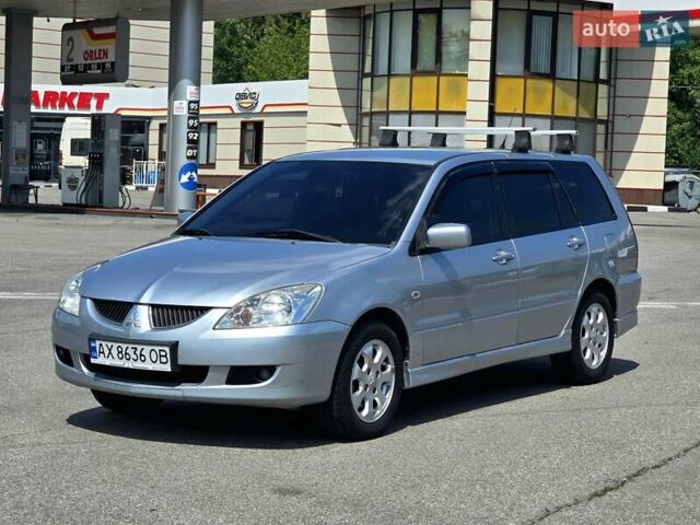 Сірий Міцубісі Lancer, об'ємом двигуна 1.6 л та пробігом 246 тис. км за 4300 $, фото 1 на Automoto.ua