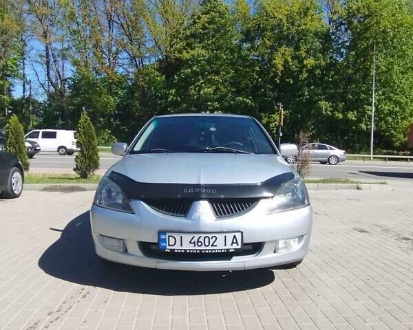 Сірий Міцубісі Lancer, об'ємом двигуна 2 л та пробігом 401 тис. км за 4700 $, фото 1 на Automoto.ua