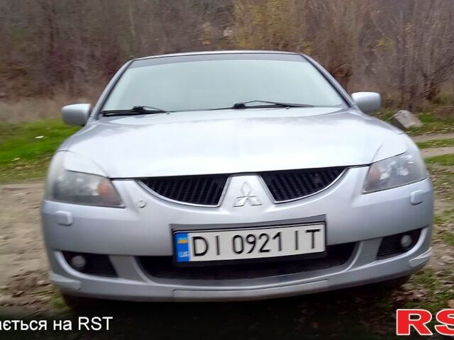 Сірий Міцубісі Lancer, об'ємом двигуна 2 л та пробігом 352 тис. км за 3950 $, фото 1 на Automoto.ua