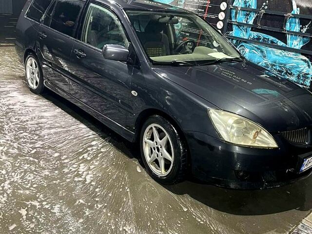 Сірий Міцубісі Lancer, об'ємом двигуна 1.6 л та пробігом 234 тис. км за 2500 $, фото 1 на Automoto.ua