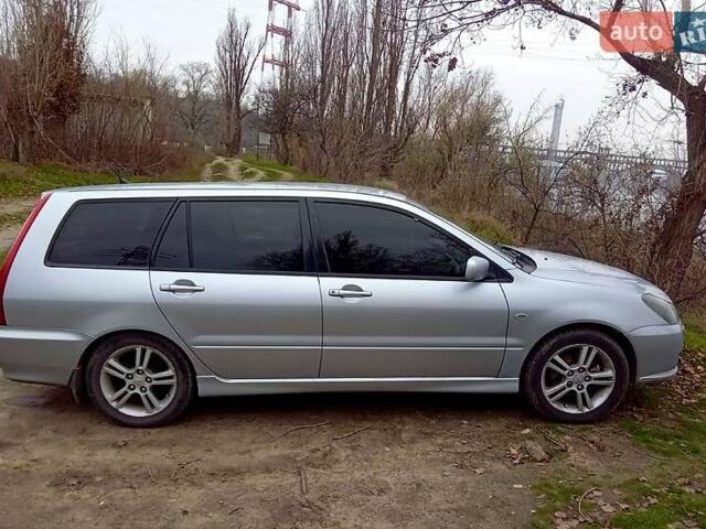 Сірий Міцубісі Lancer, об'ємом двигуна 2 л та пробігом 352 тис. км за 3950 $, фото 1 на Automoto.ua
