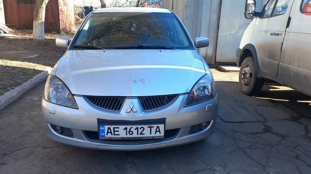 Сірий Міцубісі Lancer, об'ємом двигуна 1.6 л та пробігом 262 тис. км за 3900 $, фото 1 на Automoto.ua