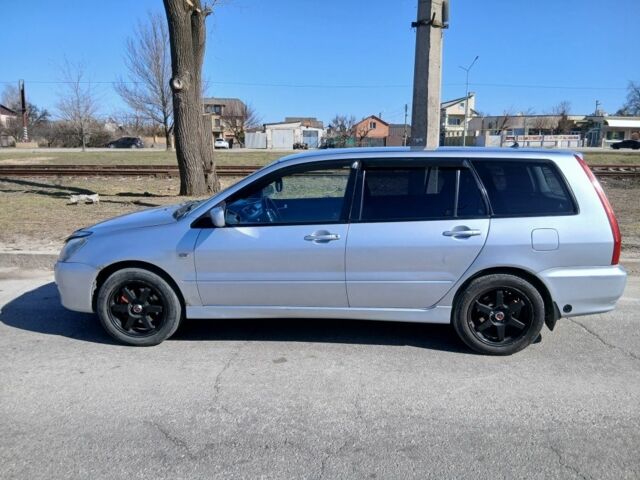 Серый Мицубиси Лансер, объемом двигателя 1.6 л и пробегом 291 тыс. км за 3700 $, фото 1 на Automoto.ua