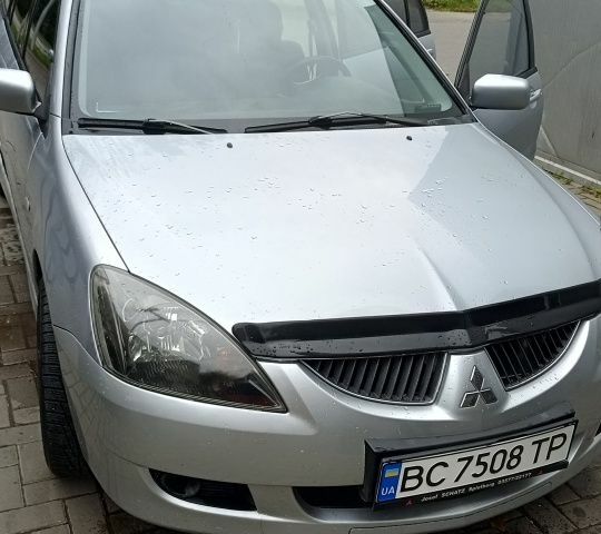 Сірий Міцубісі Lancer, об'ємом двигуна 1.6 л та пробігом 250 тис. км за 2500 $, фото 1 на Automoto.ua