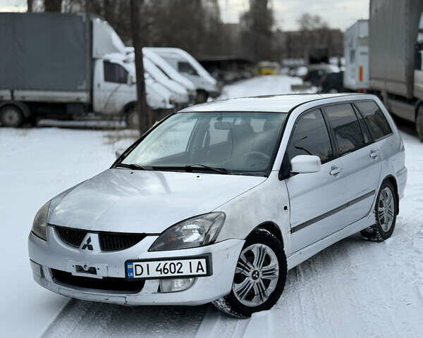 Сірий Міцубісі Lancer, об'ємом двигуна 2 л та пробігом 322 тис. км за 3300 $, фото 1 на Automoto.ua