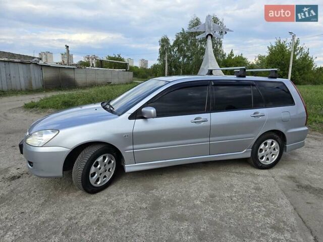 Сірий Міцубісі Lancer, об'ємом двигуна 1.6 л та пробігом 244 тис. км за 4300 $, фото 1 на Automoto.ua