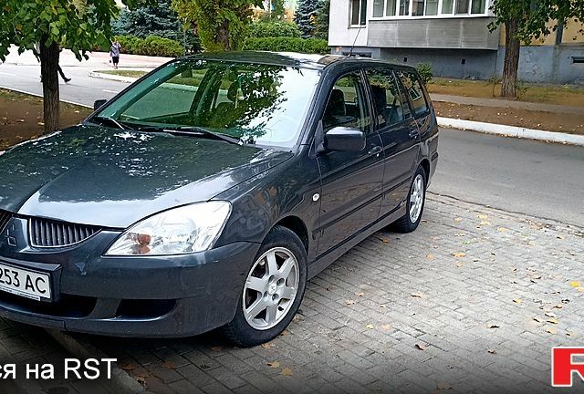 Сірий Міцубісі Lancer, об'ємом двигуна 1.6 л та пробігом 360 тис. км за 4100 $, фото 1 на Automoto.ua
