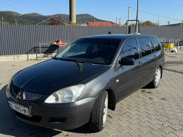 Сірий Міцубісі Lancer, об'ємом двигуна 1.6 л та пробігом 261 тис. км за 2900 $, фото 1 на Automoto.ua
