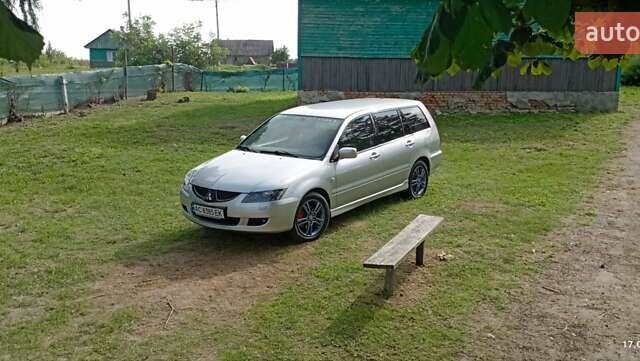 Серый Мицубиси Лансер, объемом двигателя 1.58 л и пробегом 231 тыс. км за 4500 $, фото 1 на Automoto.ua