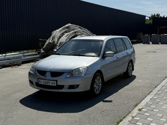 Сірий Міцубісі Lancer, об'ємом двигуна 1.6 л та пробігом 395 тис. км за 3500 $, фото 1 на Automoto.ua
