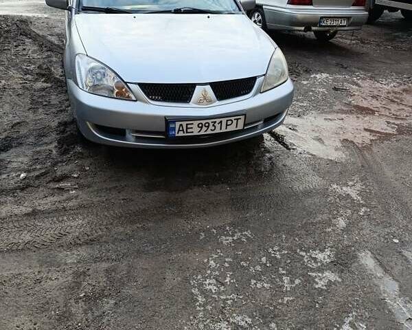 Сірий Міцубісі Lancer, об'ємом двигуна 1.6 л та пробігом 200 тис. км за 3000 $, фото 1 на Automoto.ua