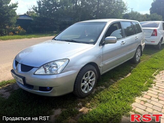Сірий Міцубісі Lancer, об'ємом двигуна 1.6 л та пробігом 150 тис. км за 3750 $, фото 1 на Automoto.ua