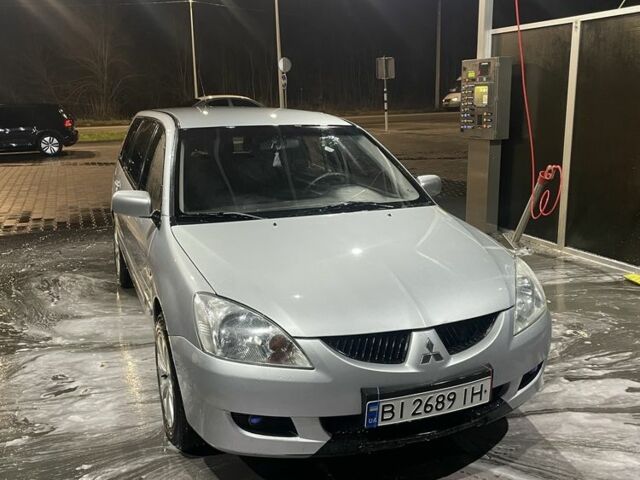 Сірий Міцубісі Lancer, об'ємом двигуна 1.6 л та пробігом 396 тис. км за 3250 $, фото 1 на Automoto.ua
