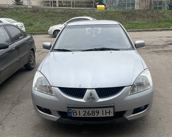 Сірий Міцубісі Lancer, об'ємом двигуна 1.6 л та пробігом 396 тис. км за 2900 $, фото 1 на Automoto.ua
