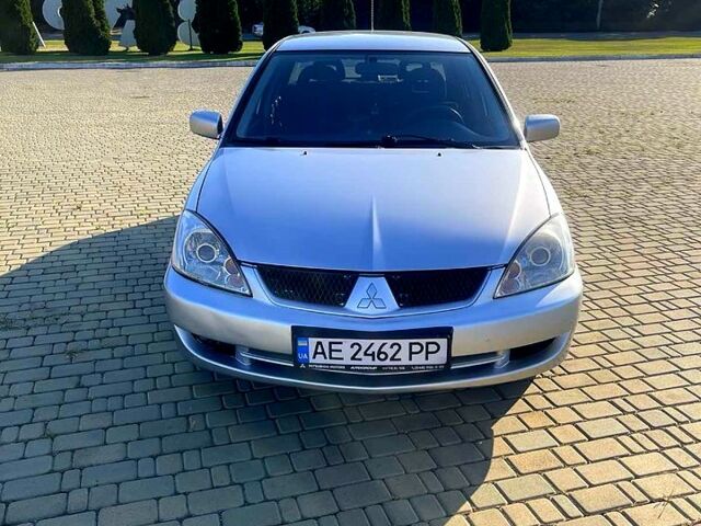 Сірий Міцубісі Lancer, об'ємом двигуна 1.6 л та пробігом 241 тис. км за 4950 $, фото 1 на Automoto.ua