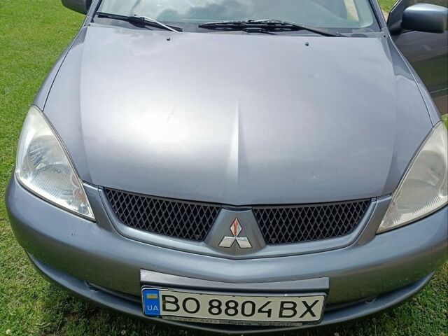 Сірий Міцубісі Lancer, об'ємом двигуна 1.6 л та пробігом 194 тис. км за 3090 $, фото 1 на Automoto.ua