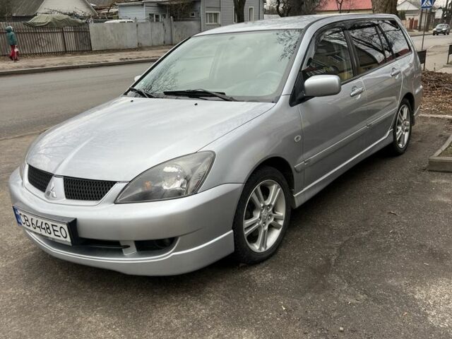 Сірий Міцубісі Lancer, об'ємом двигуна 1.6 л та пробігом 270 тис. км за 5000 $, фото 1 на Automoto.ua