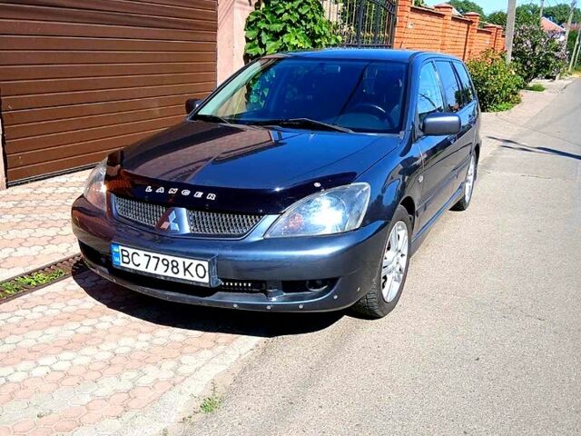 Сірий Міцубісі Lancer, об'ємом двигуна 2 л та пробігом 267 тис. км за 4350 $, фото 1 на Automoto.ua