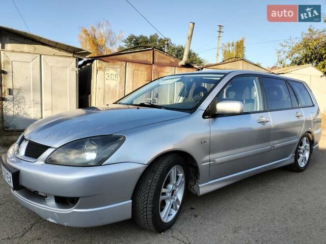 Сірий Міцубісі Lancer, об'ємом двигуна 2 л та пробігом 203 тис. км за 4700 $, фото 1 на Automoto.ua