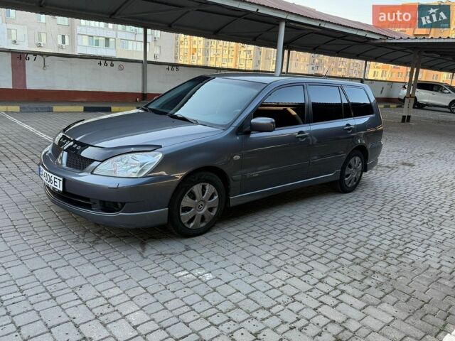 Сірий Міцубісі Lancer, об'ємом двигуна 1.6 л та пробігом 214 тис. км за 4600 $, фото 1 на Automoto.ua
