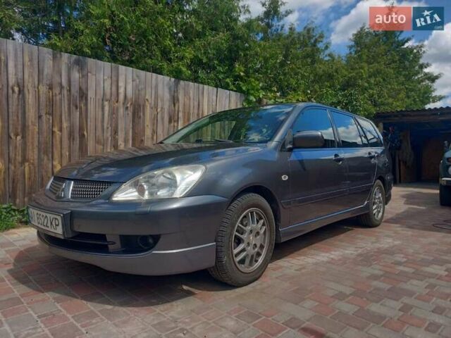 Сірий Міцубісі Lancer, об'ємом двигуна 1.6 л та пробігом 279 тис. км за 5800 $, фото 1 на Automoto.ua