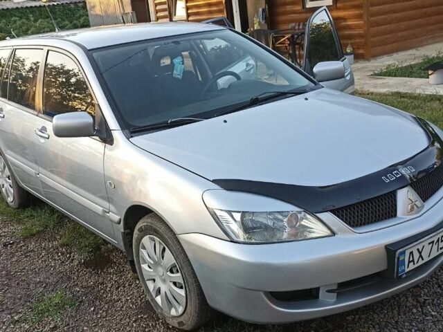 Сірий Міцубісі Lancer, об'ємом двигуна 1.6 л та пробігом 185 тис. км за 3699 $, фото 1 на Automoto.ua