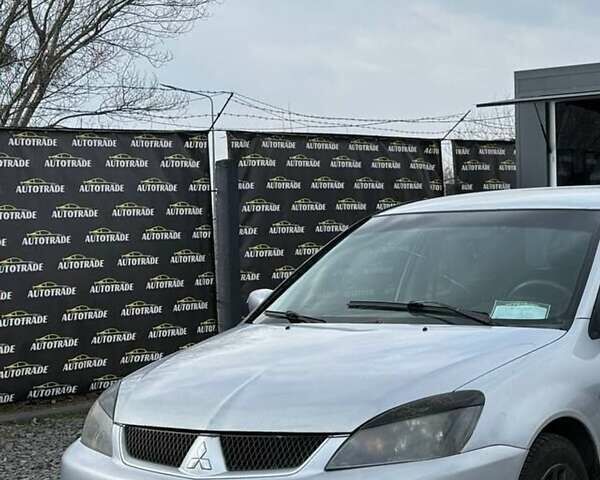 Серый Мицубиси Лансер, объемом двигателя 1.6 л и пробегом 360 тыс. км за 2900 $, фото 1 на Automoto.ua