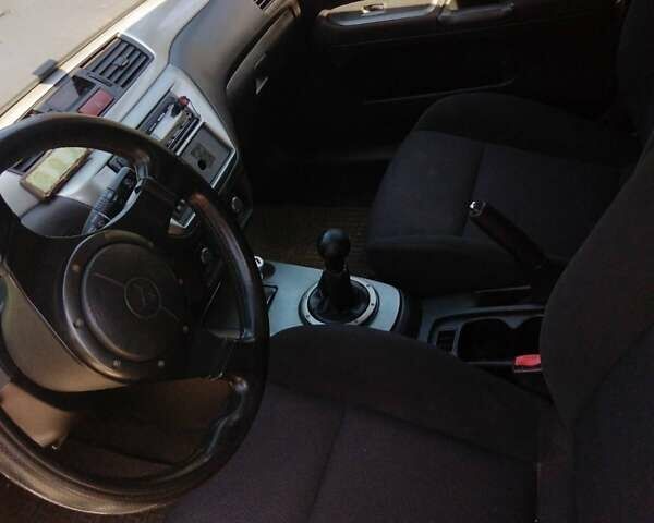 Сірий Міцубісі Lancer, об'ємом двигуна 1.58 л та пробігом 240 тис. км за 4300 $, фото 1 на Automoto.ua