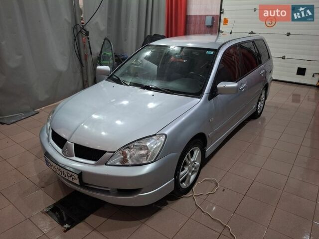 Серый Мицубиси Лансер, объемом двигателя 1.58 л и пробегом 272 тыс. км за 2800 $, фото 1 на Automoto.ua