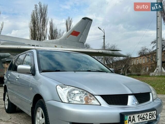Серый Мицубиси Лансер, объемом двигателя 1.6 л и пробегом 350 тыс. км за 3500 $, фото 1 на Automoto.ua