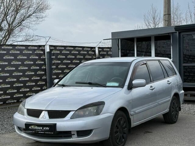Серый Мицубиси Лансер, объемом двигателя 1.6 л и пробегом 360 тыс. км за 2600 $, фото 1 на Automoto.ua