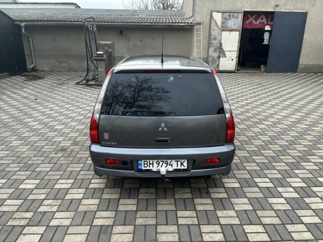 Сірий Міцубісі Lancer, об'ємом двигуна 2 л та пробігом 271 тис. км за 6350 $, фото 1 на Automoto.ua