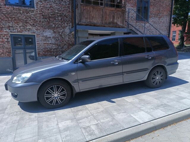 Сірий Міцубісі Lancer, об'ємом двигуна 1.6 л та пробігом 332 тис. км за 2514 $, фото 1 на Automoto.ua