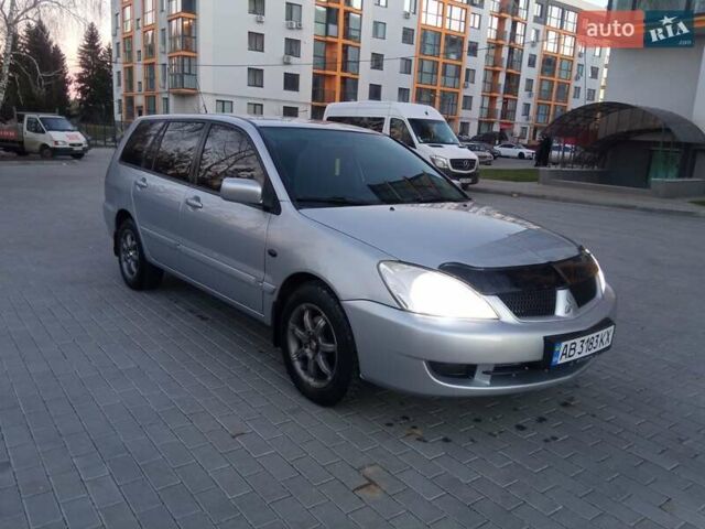 Сірий Міцубісі Lancer, об'ємом двигуна 1.58 л та пробігом 258 тис. км за 2999 $, фото 1 на Automoto.ua