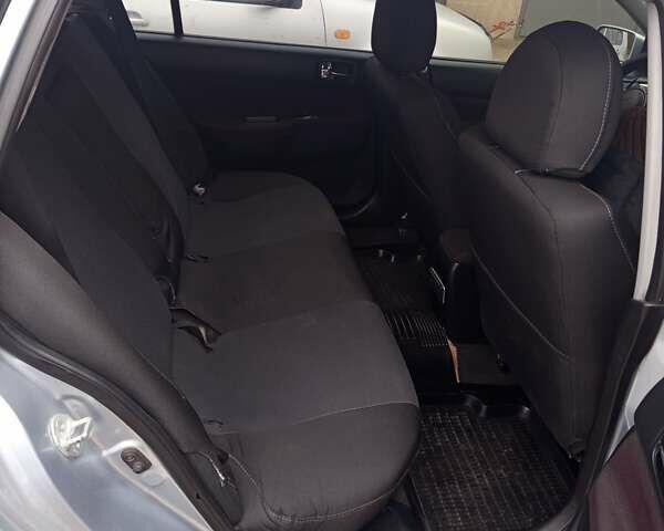 Серый Мицубиси Лансер, объемом двигателя 1.58 л и пробегом 242 тыс. км за 4250 $, фото 1 на Automoto.ua