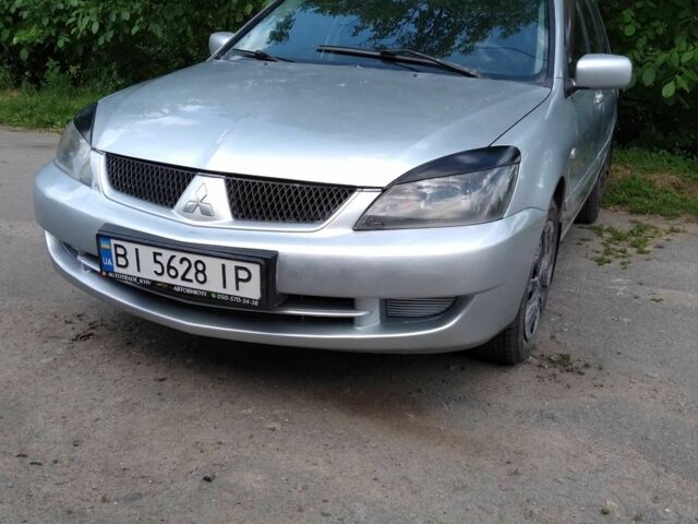 Сірий Міцубісі Lancer, об'ємом двигуна 1.6 л та пробігом 300 тис. км за 3918 $, фото 1 на Automoto.ua