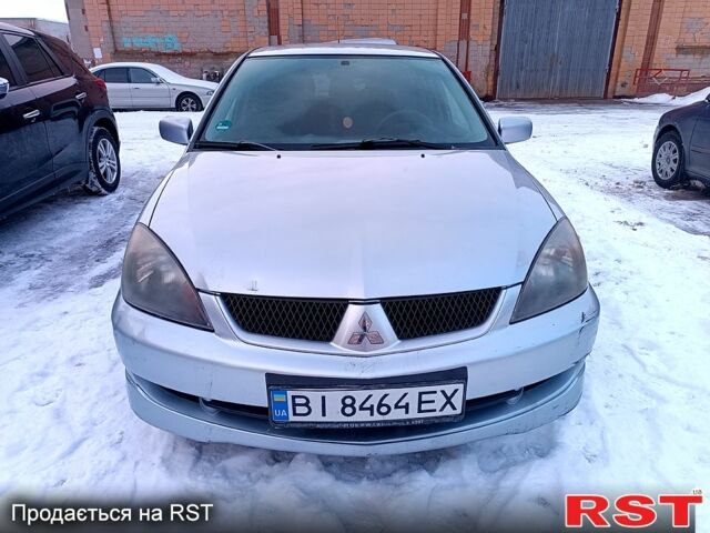 Сірий Міцубісі Lancer, об'ємом двигуна 1.6 л та пробігом 160 тис. км за 4700 $, фото 1 на Automoto.ua