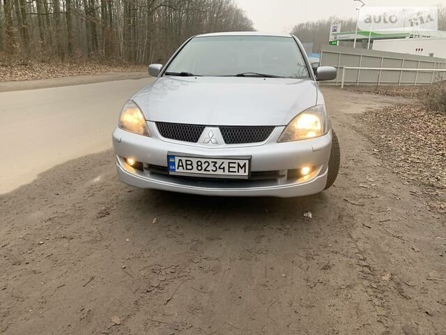 Сірий Міцубісі Lancer, об'ємом двигуна 2 л та пробігом 170 тис. км за 4999 $, фото 1 на Automoto.ua