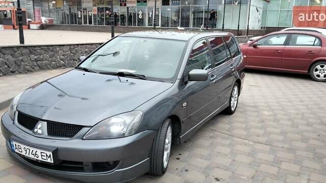 Сірий Міцубісі Lancer, об'ємом двигуна 2 л та пробігом 217 тис. км за 4600 $, фото 1 на Automoto.ua