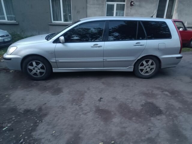 Сірий Міцубісі Lancer, об'ємом двигуна 1.6 л та пробігом 399 тис. км за 2950 $, фото 1 на Automoto.ua