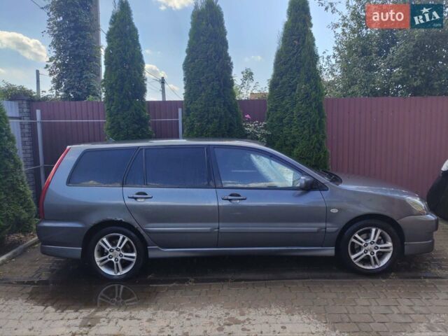 Сірий Міцубісі Lancer, об'ємом двигуна 1.6 л та пробігом 300 тис. км за 3800 $, фото 1 на Automoto.ua