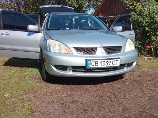 Сірий Міцубісі Lancer, об'ємом двигуна 1.6 л та пробігом 370 тис. км за 4500 $, фото 1 на Automoto.ua