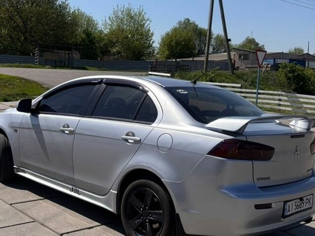 Сірий Міцубісі Lancer, об'ємом двигуна 2 л та пробігом 250 тис. км за 4950 $, фото 1 на Automoto.ua