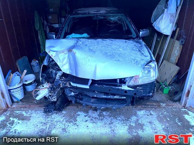 Серый Мицубиси Лансер, объемом двигателя 1.6 л и пробегом 314 тыс. км за 2300 $, фото 1 на Automoto.ua