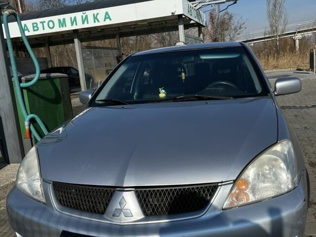 Сірий Міцубісі Lancer, об'ємом двигуна 1.6 л та пробігом 311 тис. км за 3800 $, фото 1 на Automoto.ua