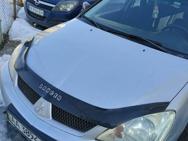 Серый Мицубиси Лансер, объемом двигателя 1.6 л и пробегом 198 тыс. км за 4100 $, фото 1 на Automoto.ua