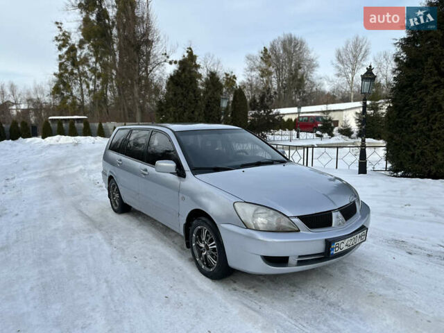 Серый Мицубиси Лансер, объемом двигателя 1.6 л и пробегом 270 тыс. км за 2699 $, фото 1 на Automoto.ua